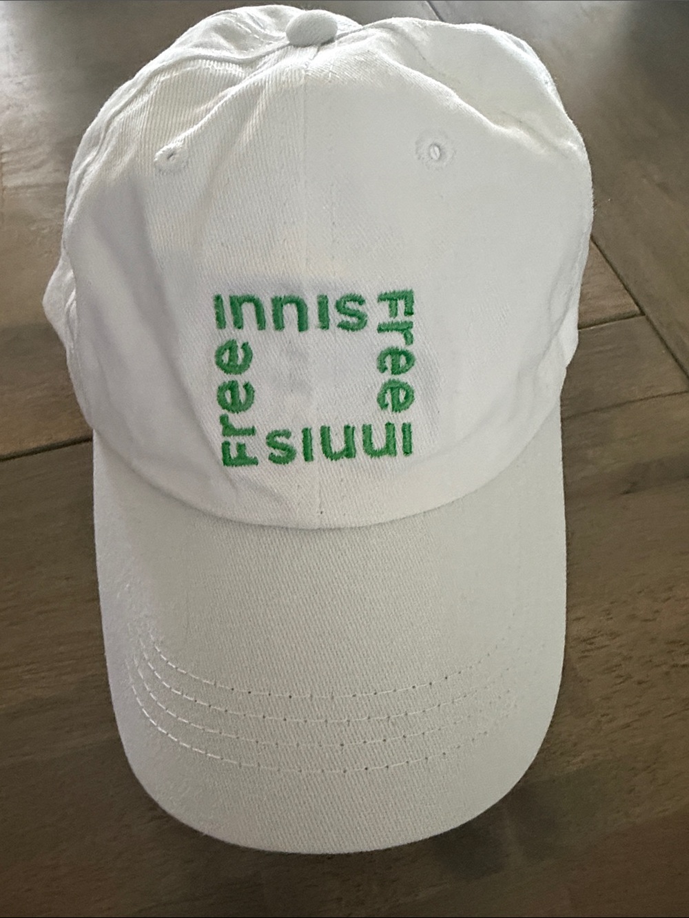 Unknown Brand White Baseball Cap with Green Embroidered Logo